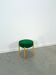 Houten vintage kruk met groen kussen