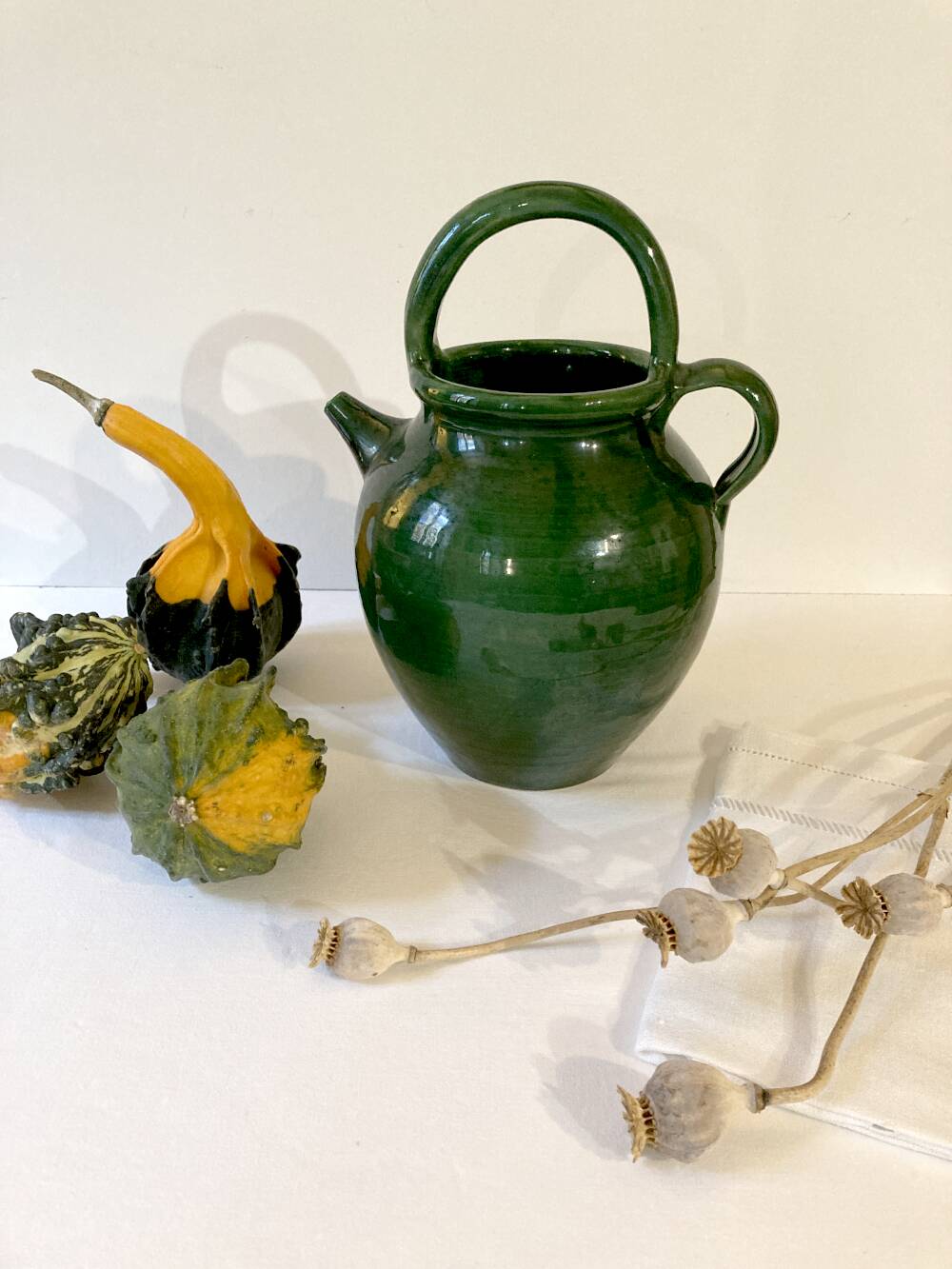 Emerald green glazed terracotta goat jug