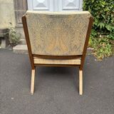 Vintage wooden armchair from the 1960s