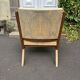 Vintage wooden armchair from the 1960s
