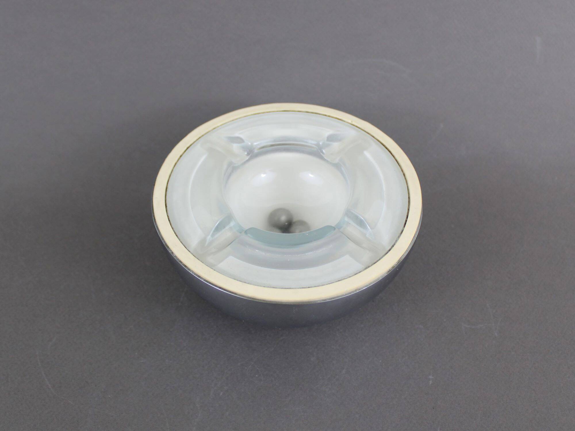 Puzzle ball ashtray design in vintage metal from the 70s