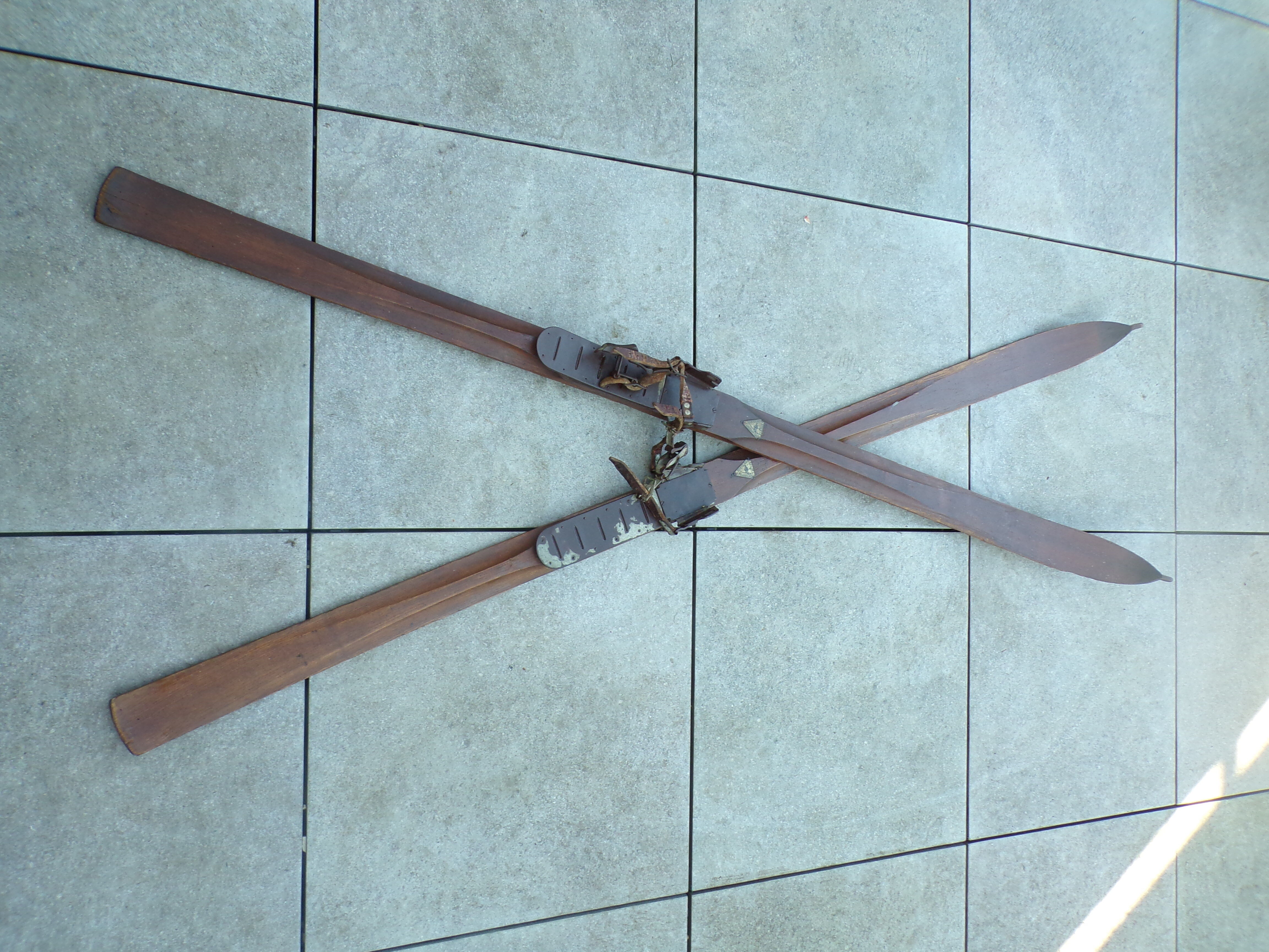 Pair of old skis in wood