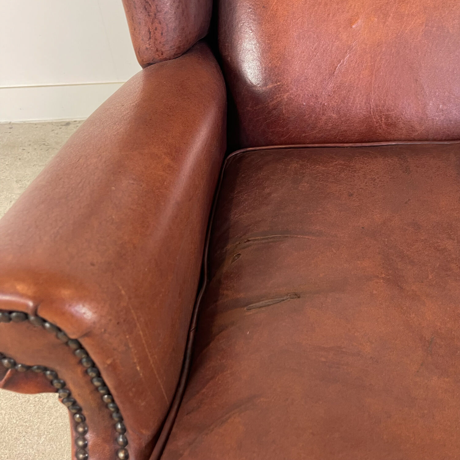 Vintage sheep leather wingback armchair, Druten