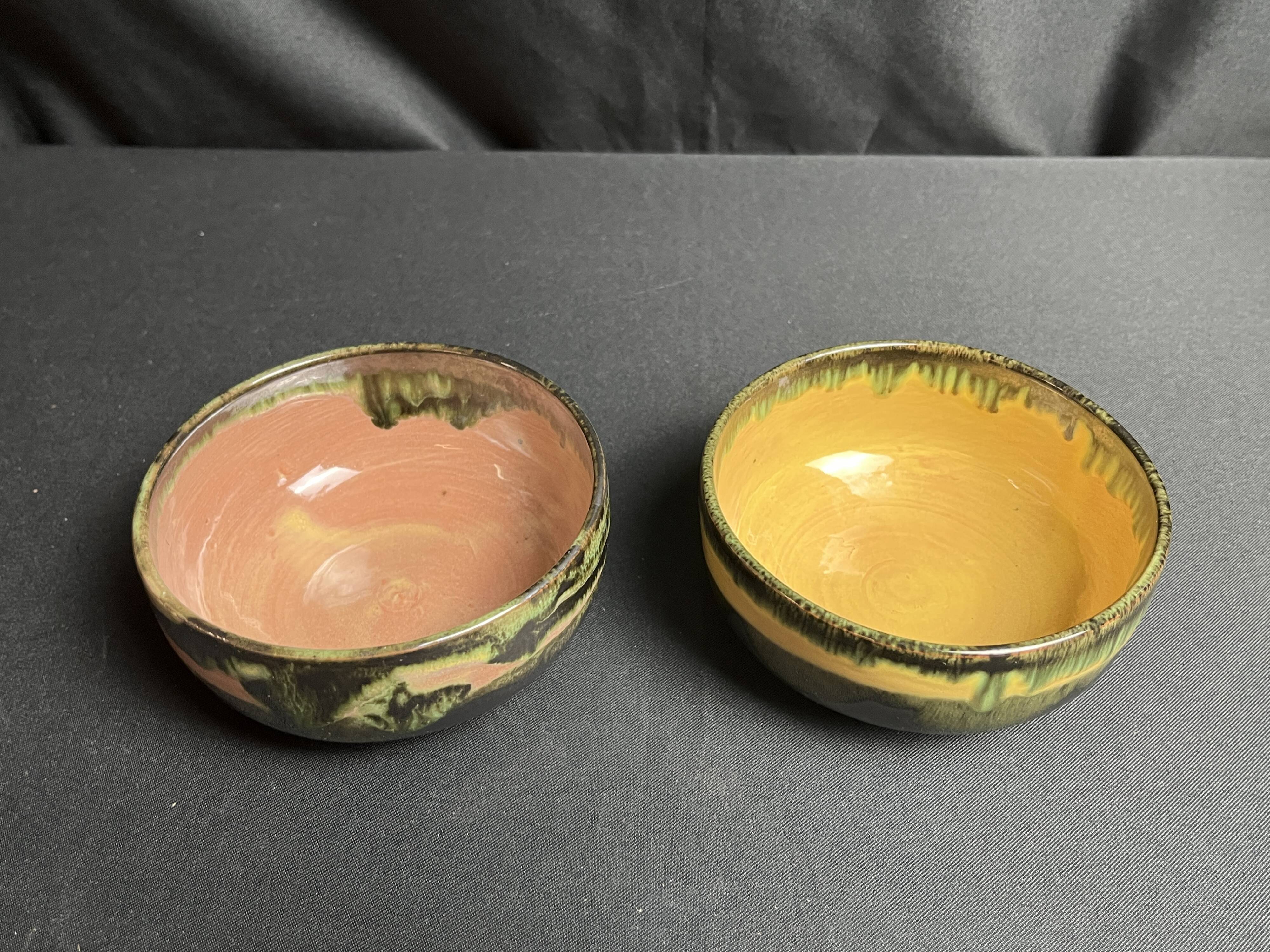 Vintage, two flamed stoneware bowls from the 20th century.
