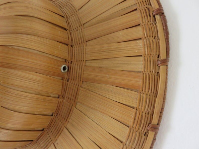 Colonial hat in bamboo and braided rattan, wall decoration