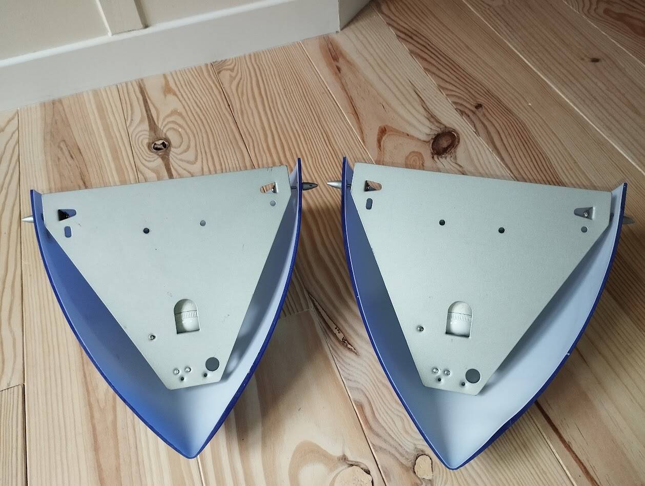a pair of Ikea Kvintett wall lamps