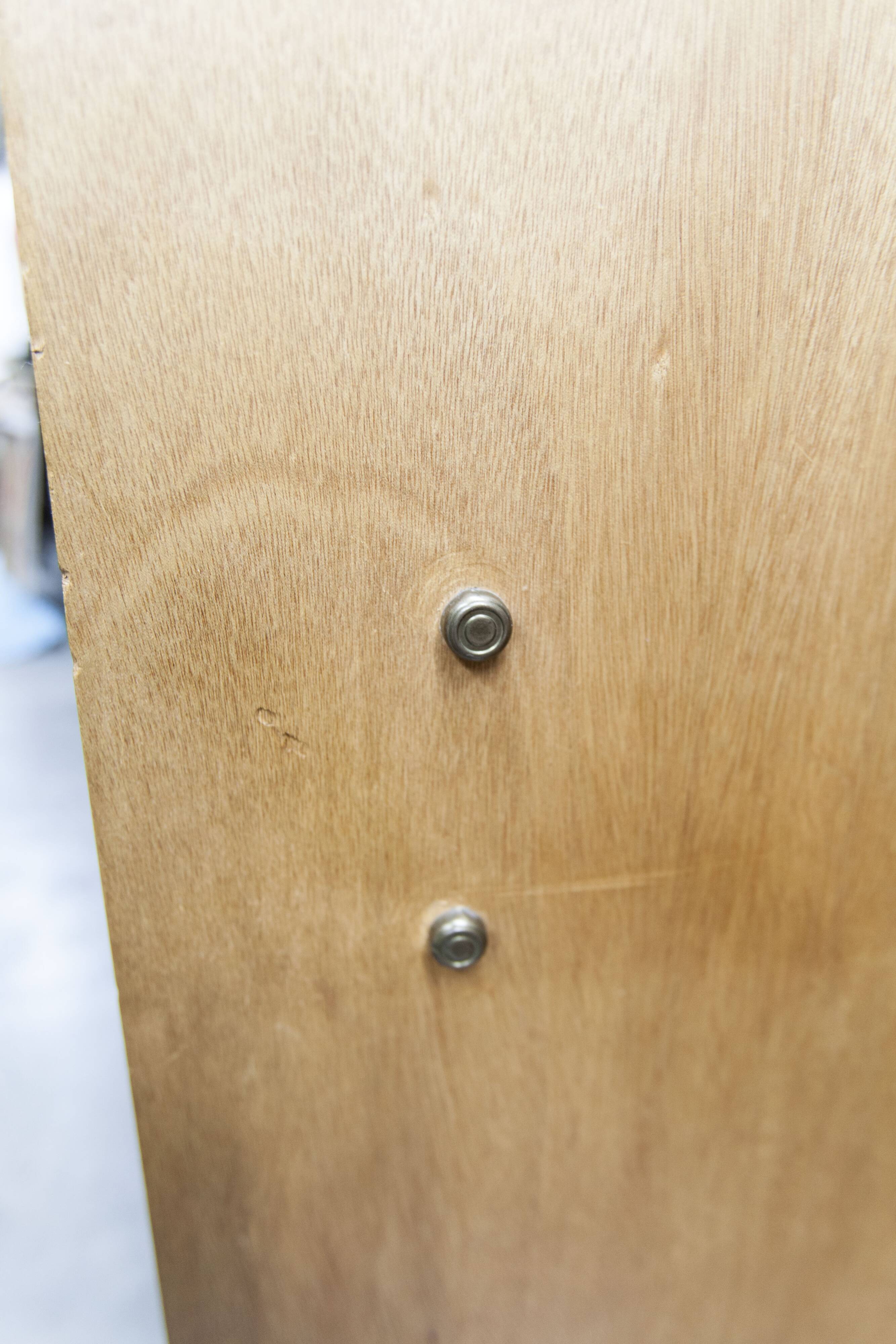 1950s Mid-Century Modern oak armoire with two doors and two drawers.