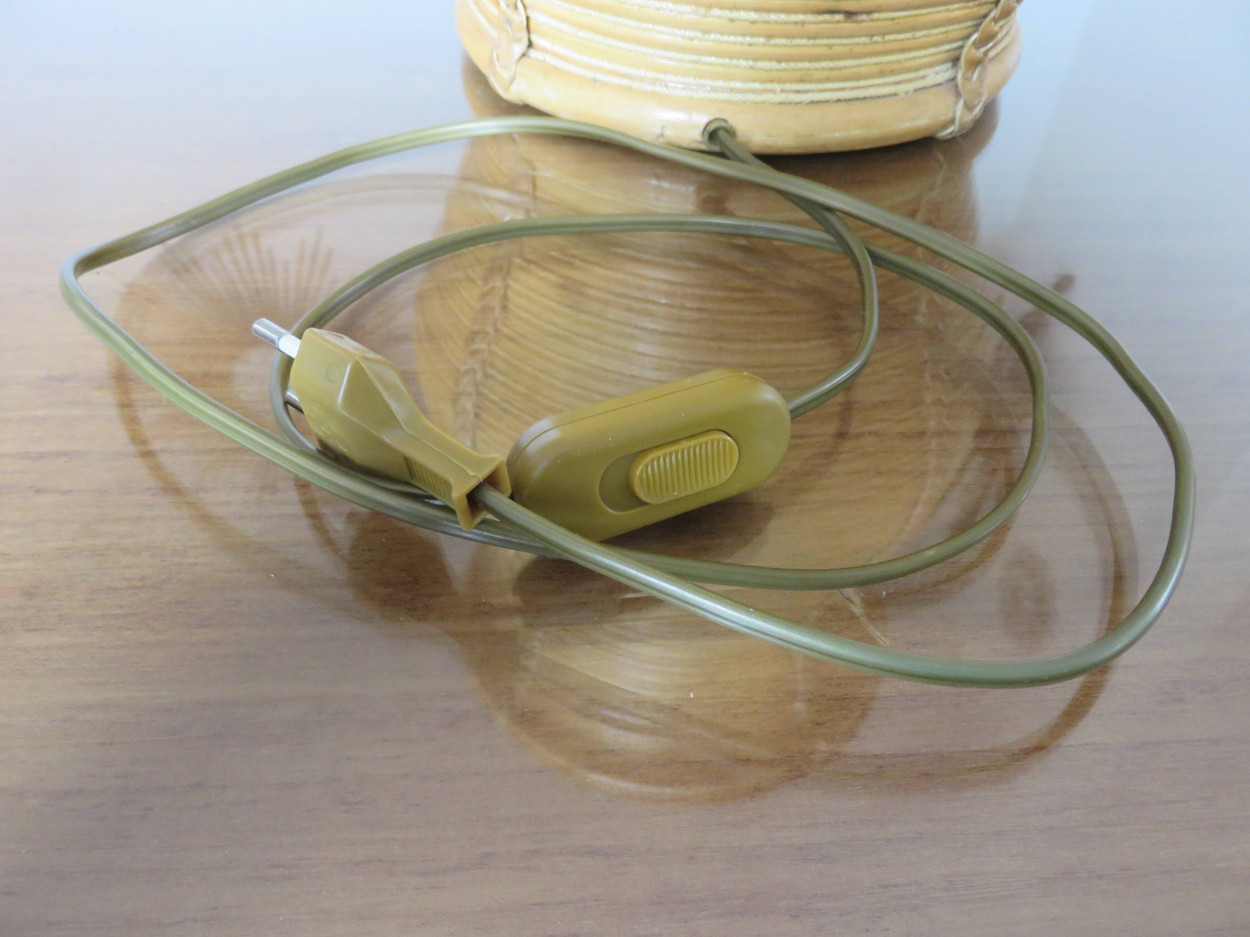 Rattan, leather, rope, and wood lamp in the style of Gabriella Crespi 60-70.