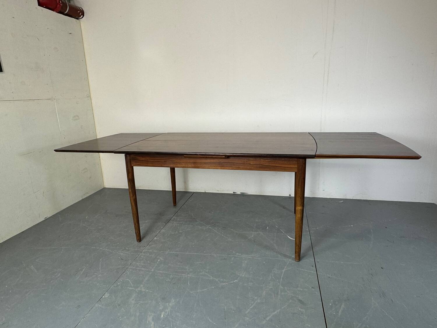 Table à manger extensible en palissandre moderniste du milieu du siècle, Danemark, années 1950