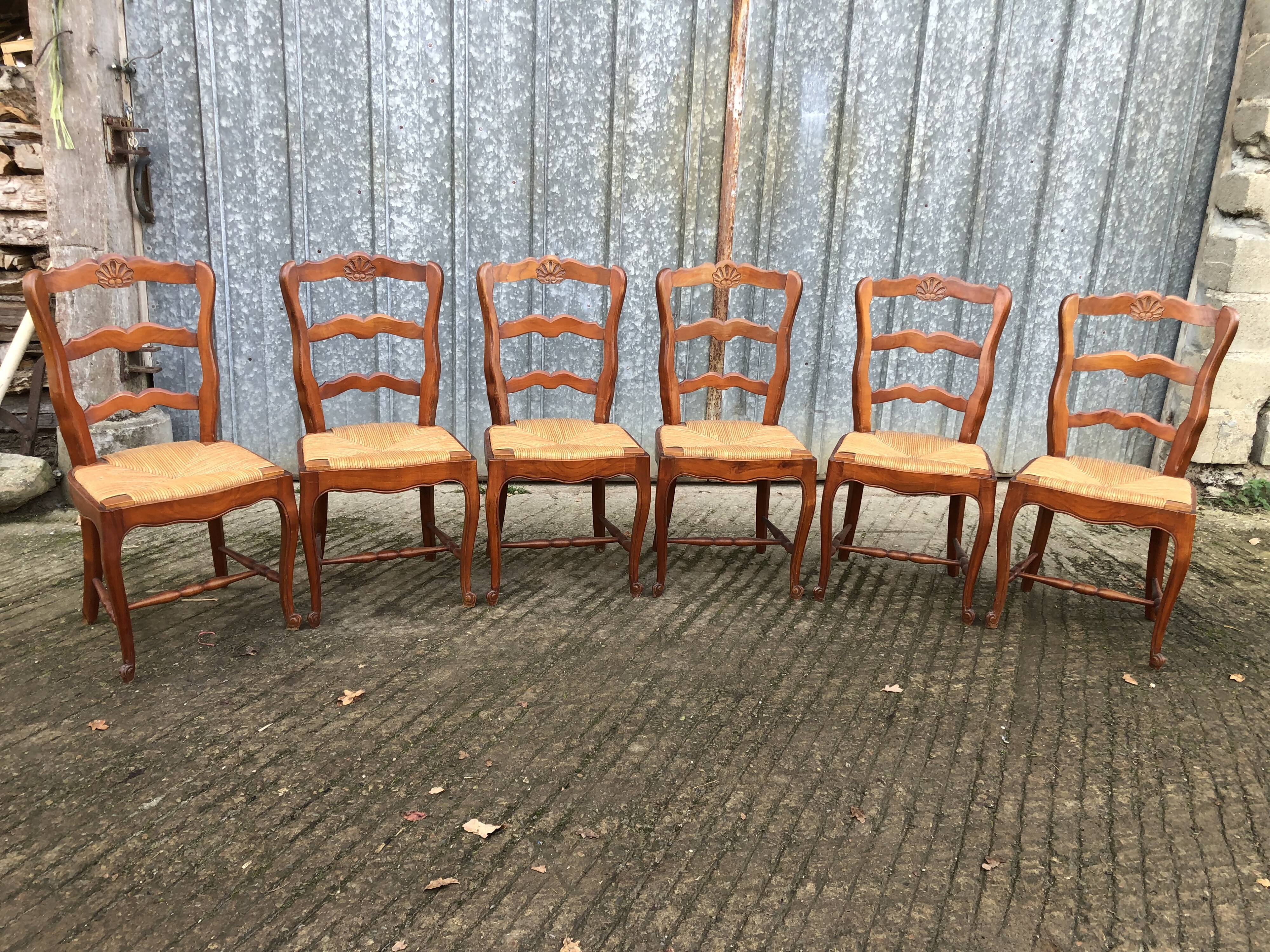 6 rush-seated chairs in solid cherry wood in Louis XV style
