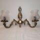 Pair of wall sconces in gilded brass and engraved glass.
