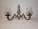 Pair of wall sconces in gilded brass and engraved glass.