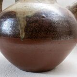 Old sandstone water pitcher.