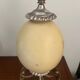Pied de lampe en métal argenté et œuf d’autruche fin XXeme