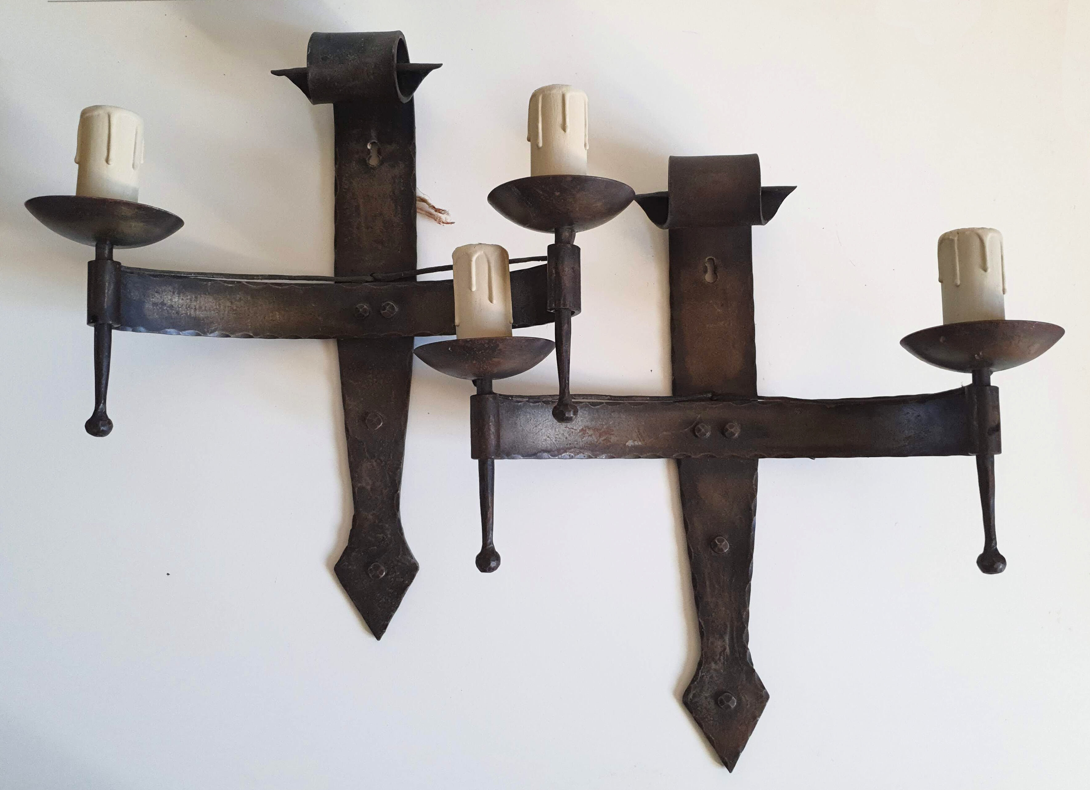 Duo of wrought iron wall lamps by Jean Touret Atelier Marolles