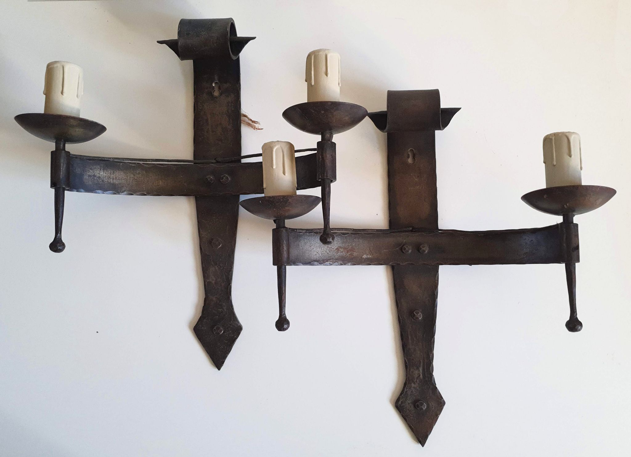 Duo of wrought iron wall lamps by Jean Touret Atelier Marolles