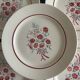Service of 13 plates and a Badonviller dish