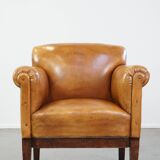 Restored antique Art Deco sheep leather armchair