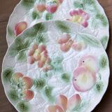 Two slip plates decorated with fruit.