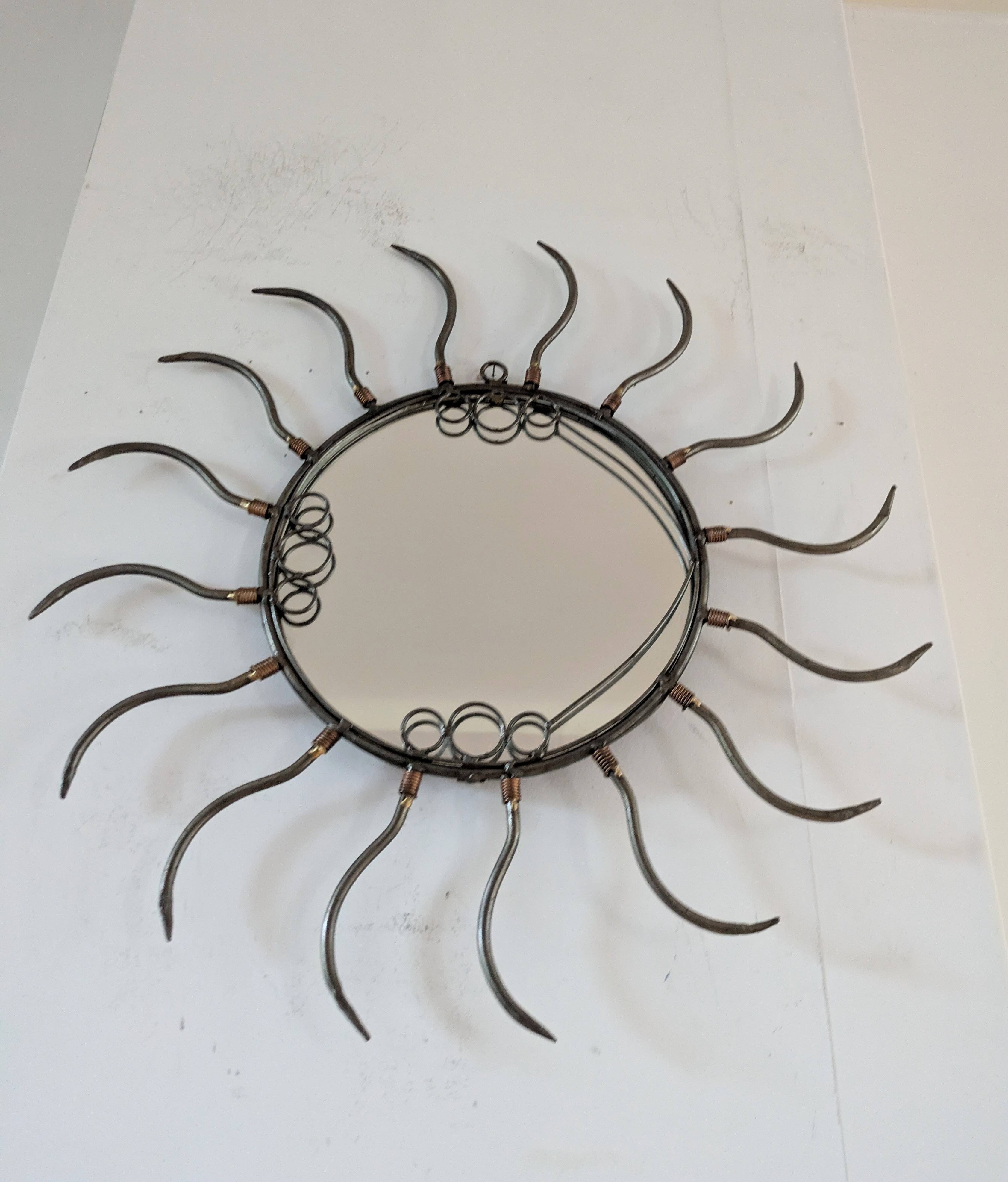 Metal sun mirror