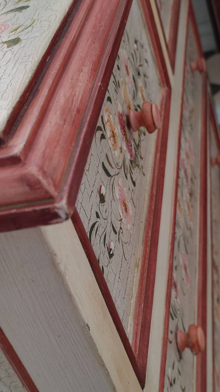 Painted chest of drawers with floral decoration