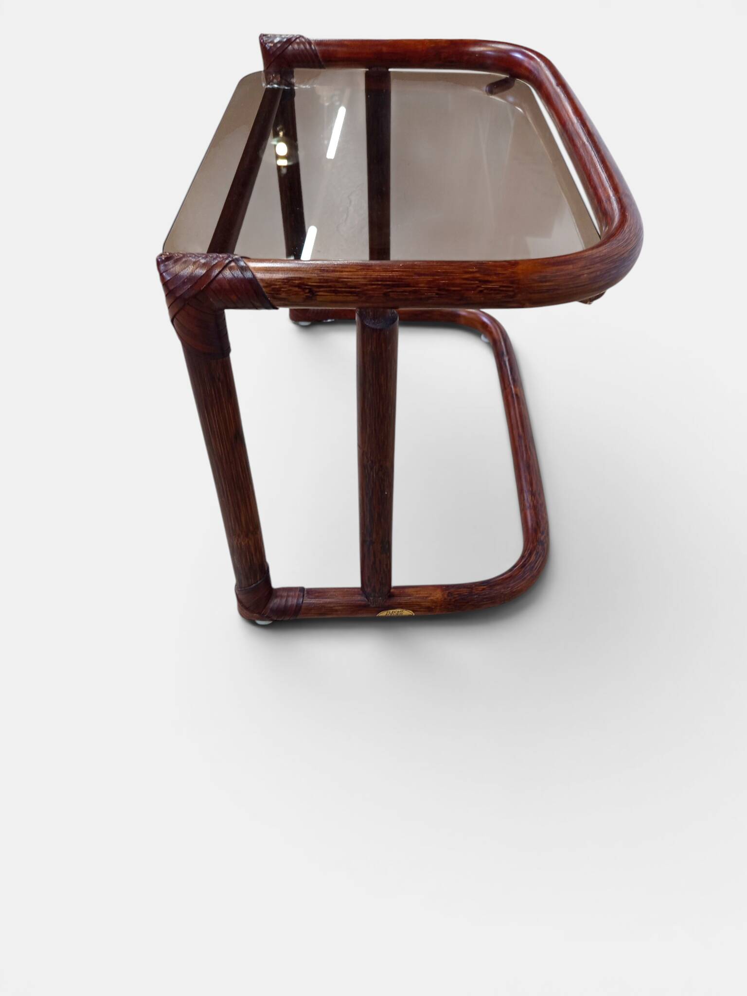 Vintage nesting tables in rattan and smoked glass by Flecht-Atelier Schütz.