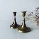 Pair of brass cord candle holders