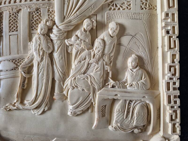 Sculpted resin plaque in the style of China.