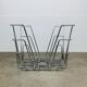 Chrome metal magazine rack or vinyl holder from the 70s.