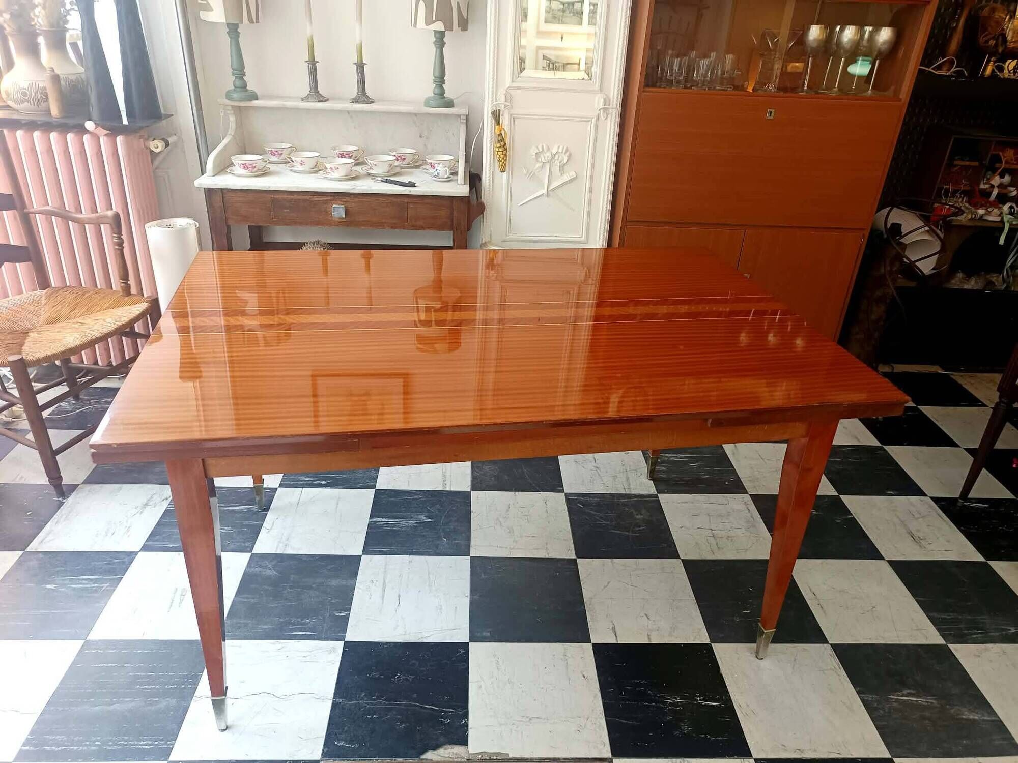 Mid-century vintage coffee table with tapered legs.