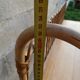 vintage rattan shelf on stand