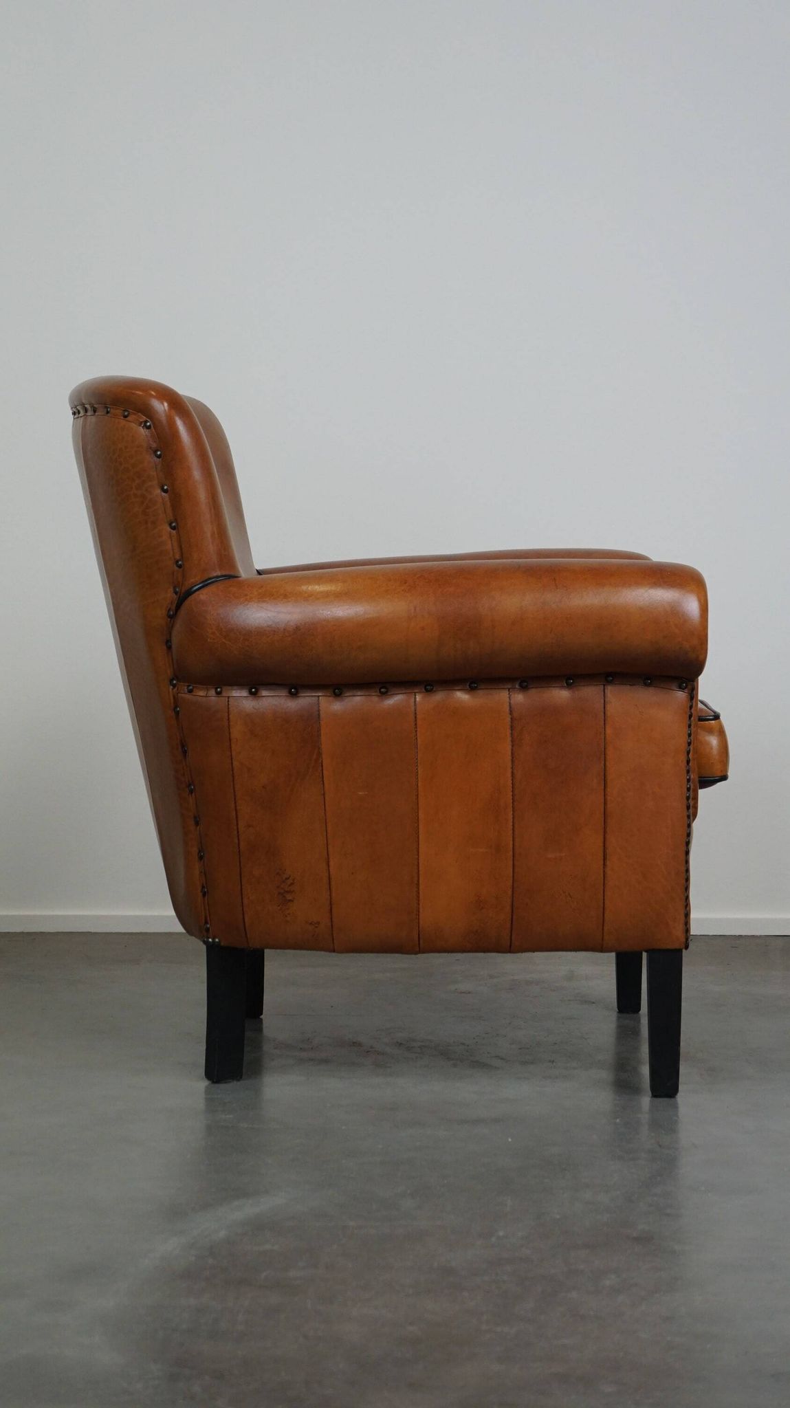 Fauteuil en cuir de mouton à l'aspect luxueux