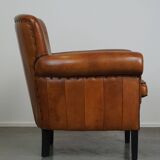 Fauteuil en cuir de mouton à l'aspect luxueux