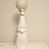 Lampe de table en céramique blanche, éléphant tenant une boule allumée