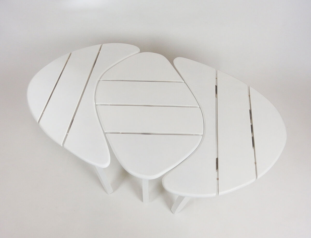 Three garden coffee tables by Huguonnet
