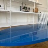 Oval coffee table in blue lacquered wood