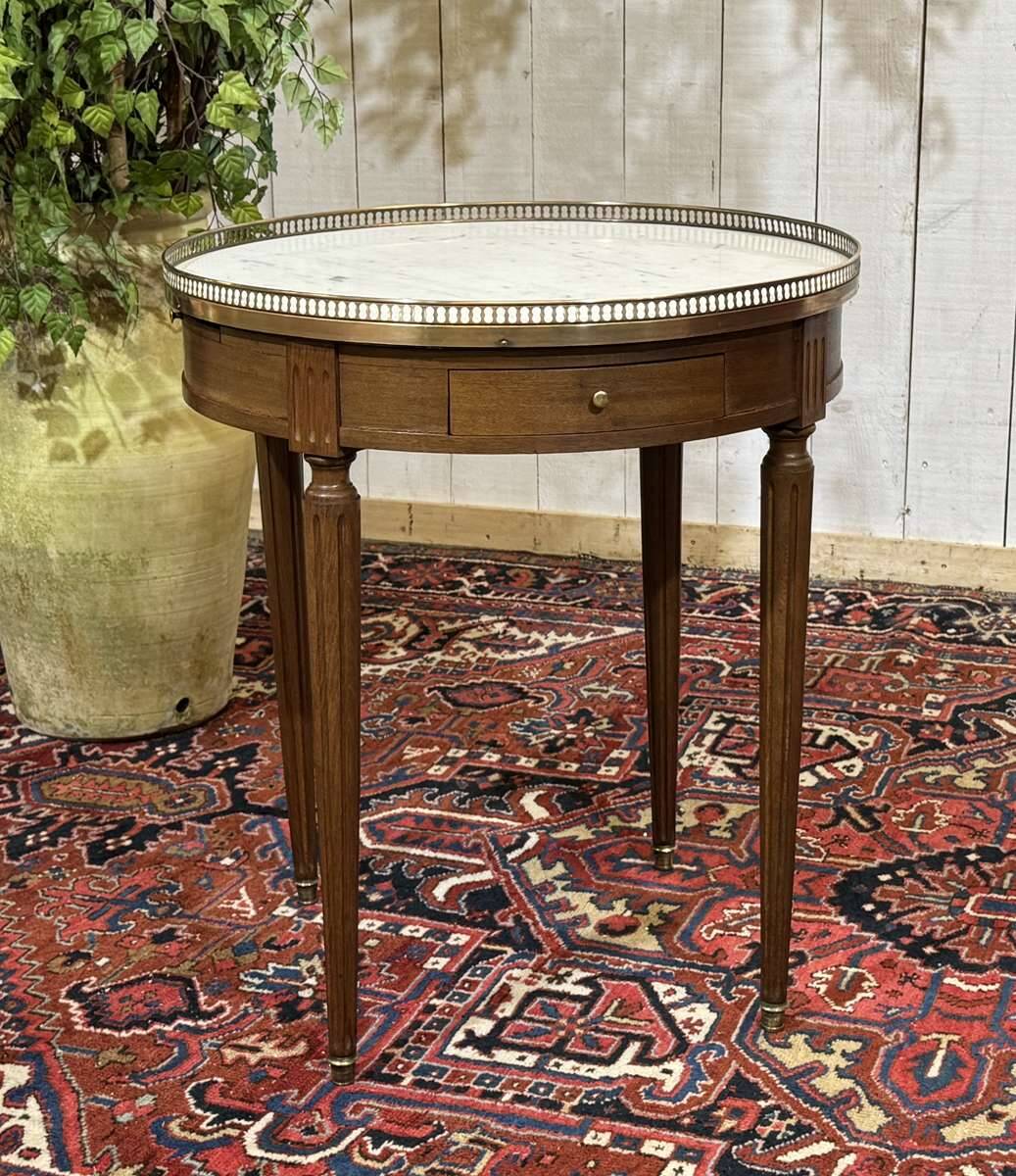 Louis XVI style bouillotte table from the 1960s in mahogany with a marble top.