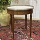 Louis XVI style bouillotte table from the 1960s in mahogany with a marble top.