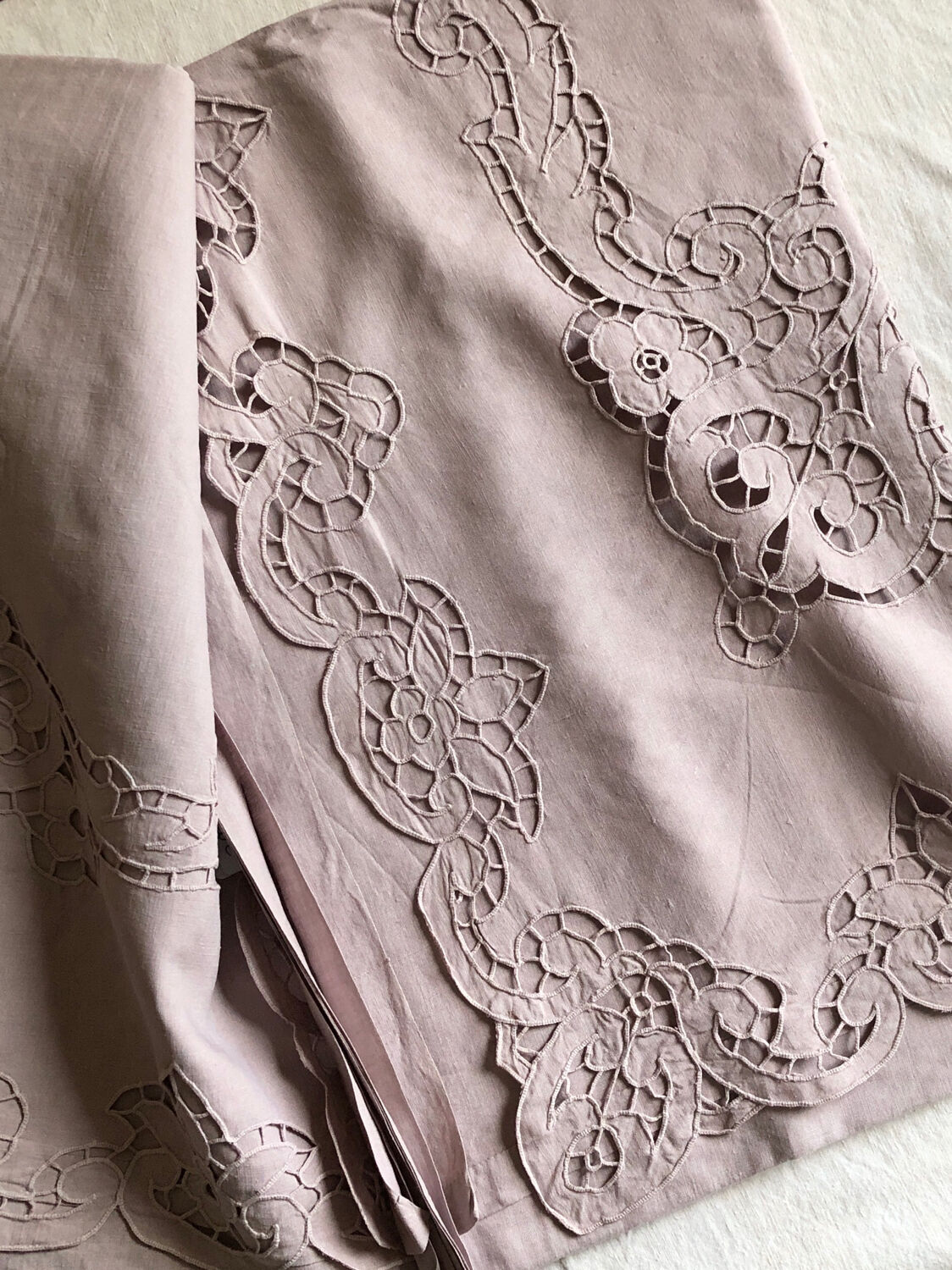 Old embroidered towel tinted purple aurora