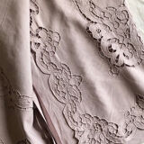 Old embroidered towel tinted purple aurora