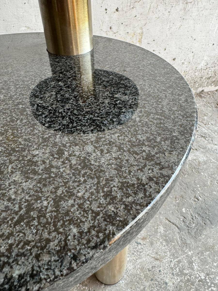 Memphis coffee table in black/gray granite and brushed stainless steel — sculptural double-tiered table in a postmodern 1980s style
