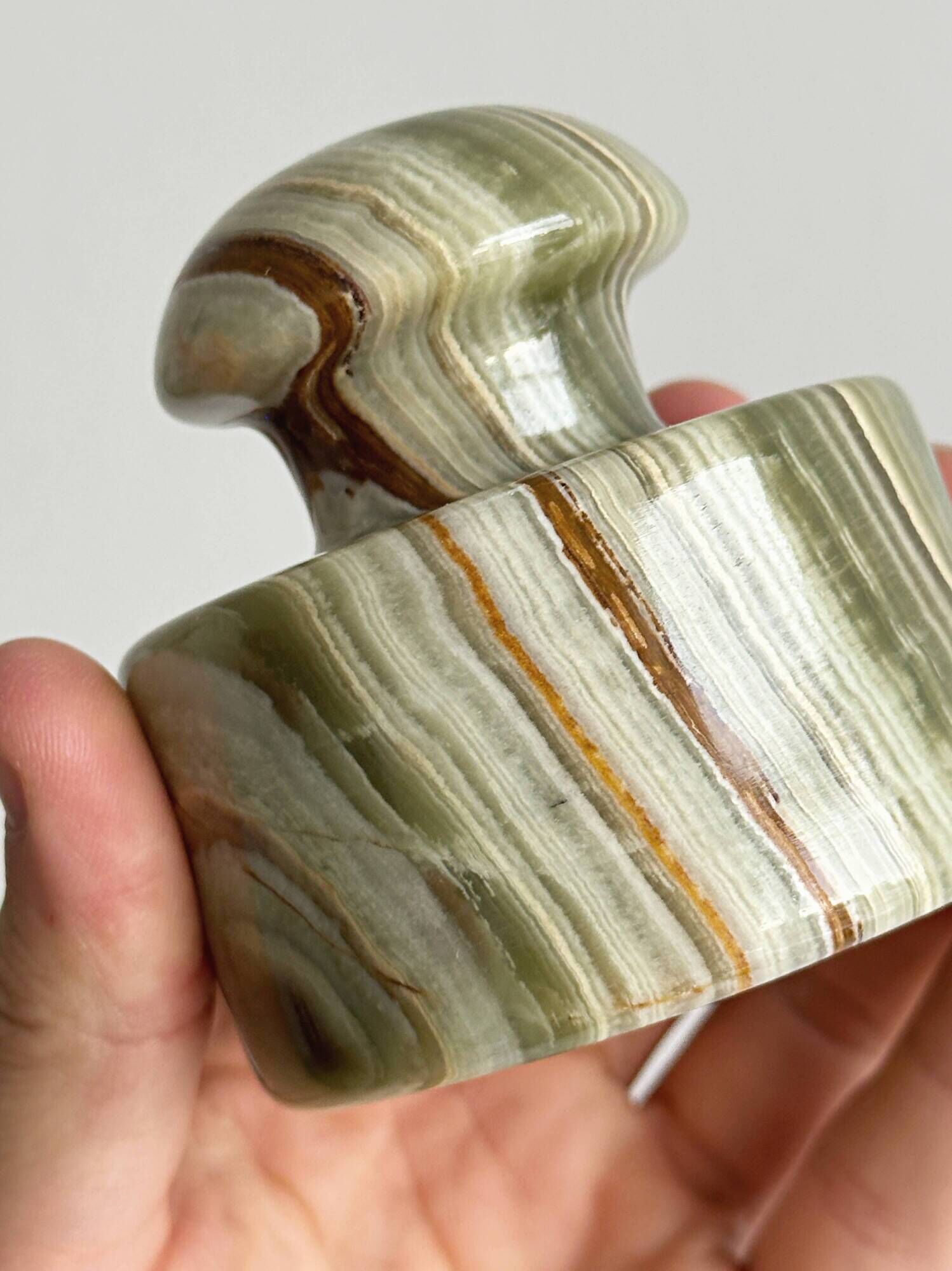 Green veined stone paperweight