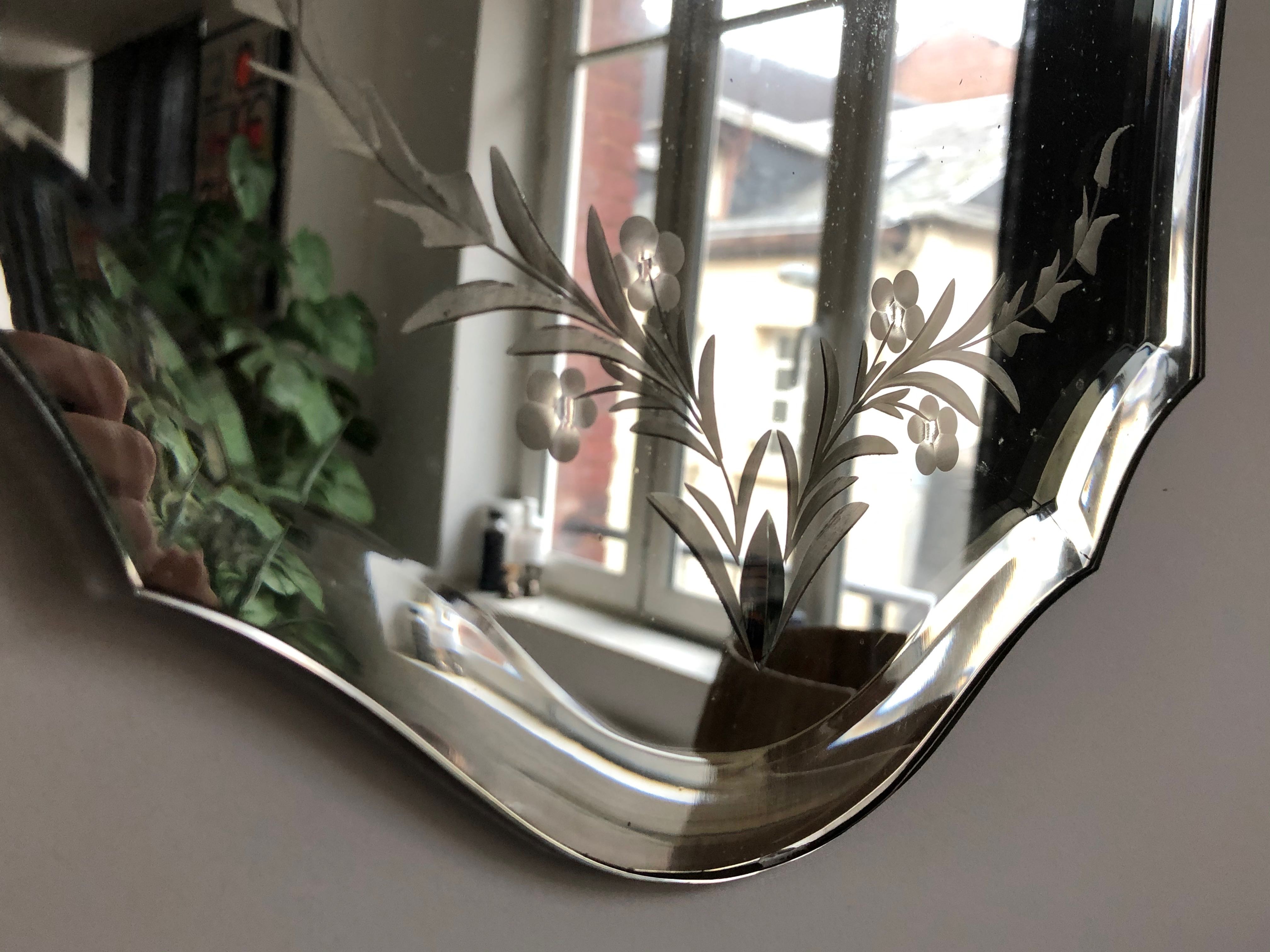 Old bevelled and engraved mirror   43x63cm