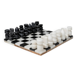 Vintage black-and-white marble chessboard with matching marble pieces, Italian 1960s design, sculptural centerpiece