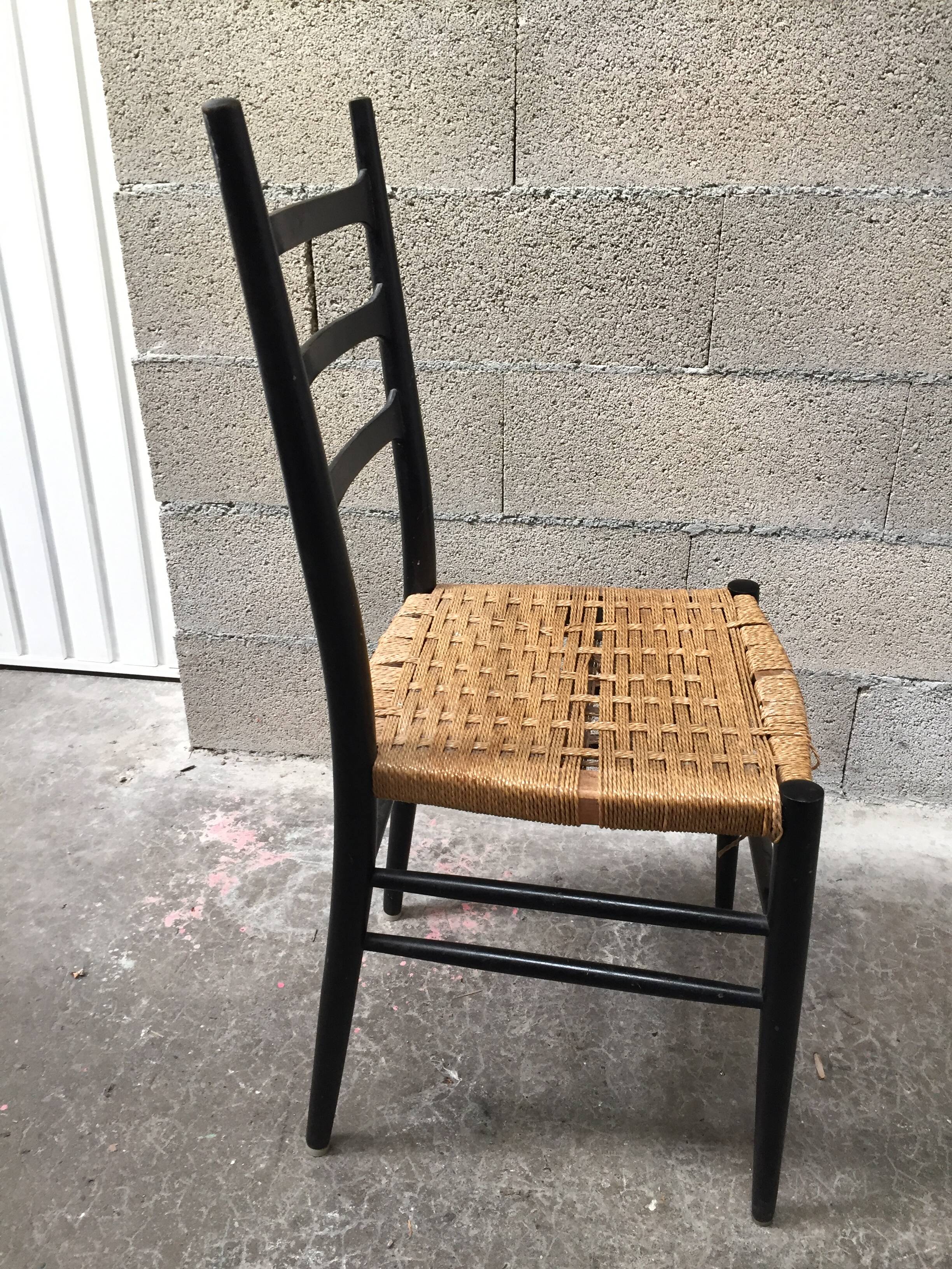 Set of 7 blackened wooden chairs, 1960s vintage