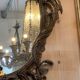 Large gilded wooden mirror, richly carved with winged dragons, 19th century