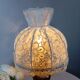 Table lamp with romantic wood and lace ambiance, retro chic