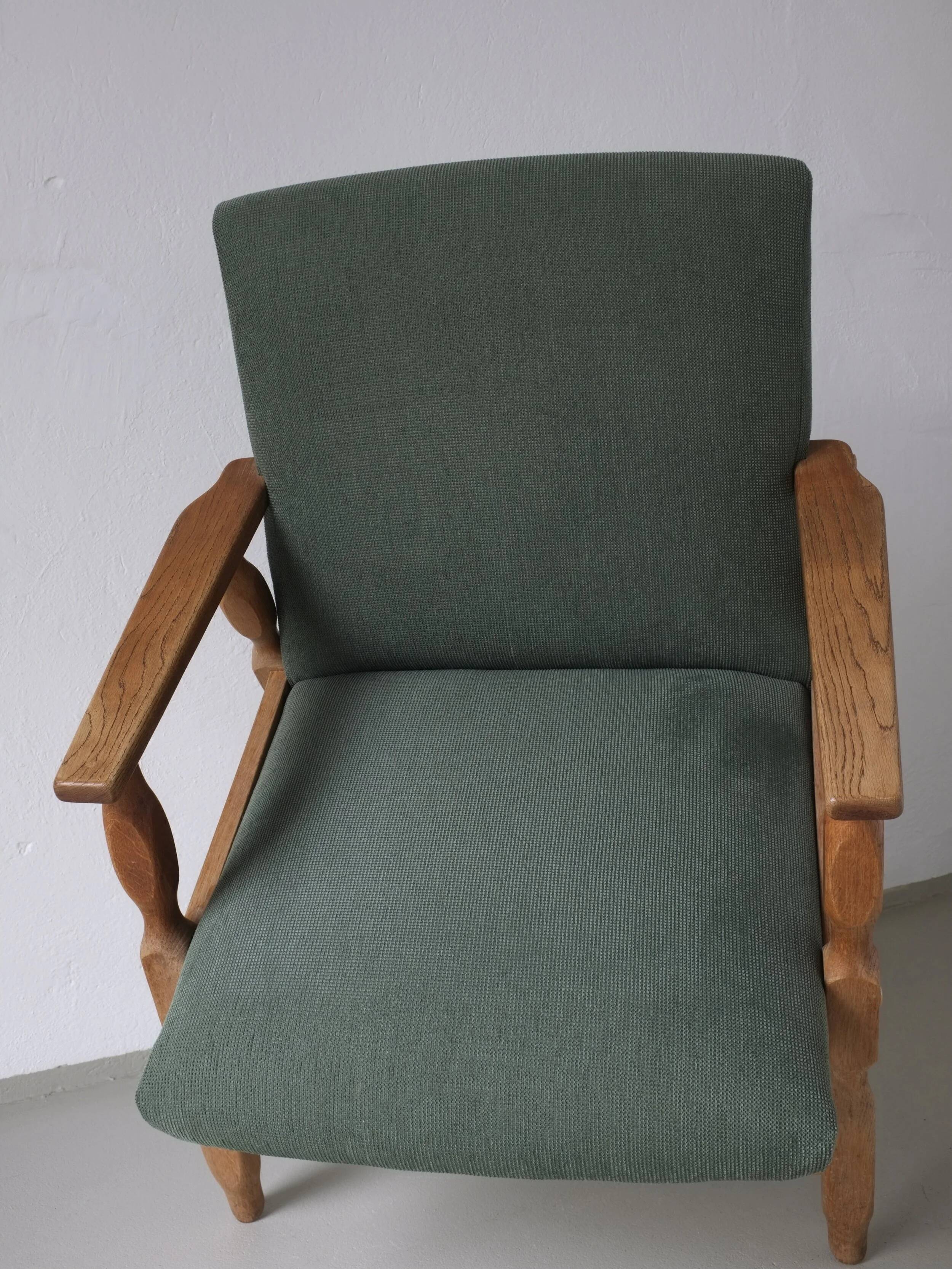 Henning Kjaernulf oak scalloped lounge chair | Denmark | 1950s