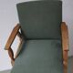 Henning Kjaernulf oak scalloped lounge chair | Denmark | 1950s