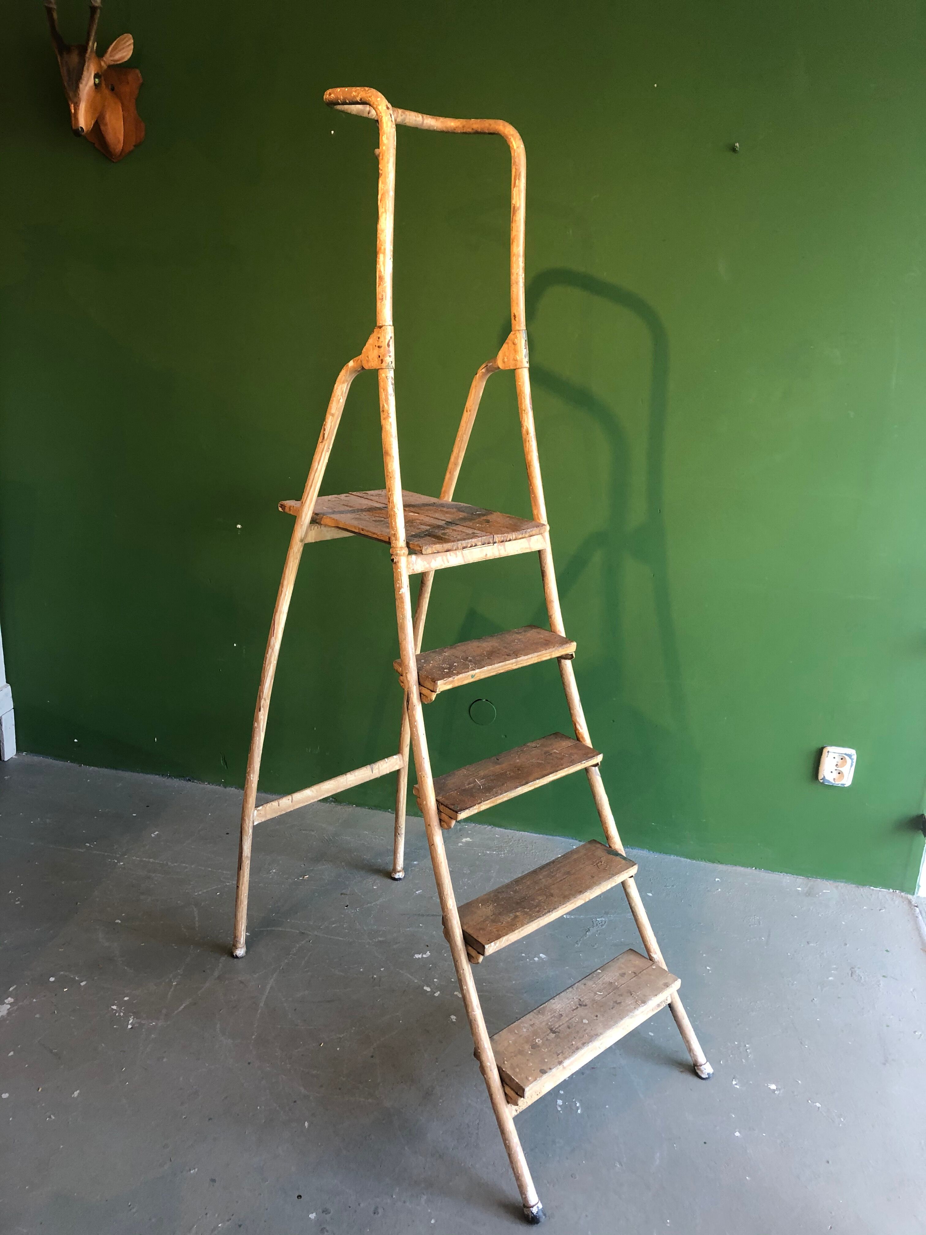 Industrial old sturdy wooden ladder